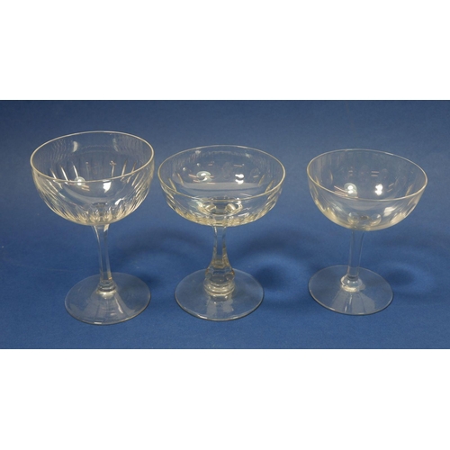 185 - A set of six cut glass champagne glasses and nine others