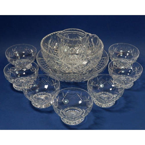 188 - A set of seven Stuart cut glass dessert dishes, a jug and two cut glass fruit bowls