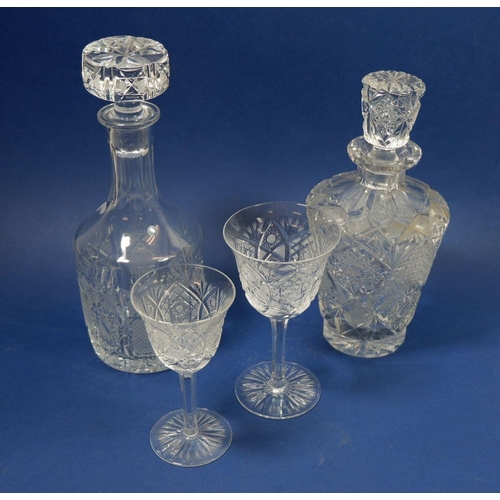 191 - A suite of cut glass with star burst design consisting of a set of six and ten wine glasses together... 