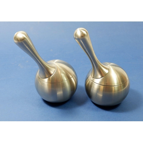 201A - A Georg Jensen pair of stainless steel salt and pepper grinders