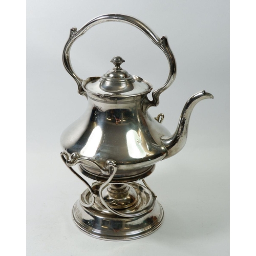 202 - A silver plated kettle on stand and a silver plated cake basket