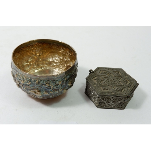 203 - A Burmese white metal bowl embossed animals and foliage, 29g, 6.5cm diameter