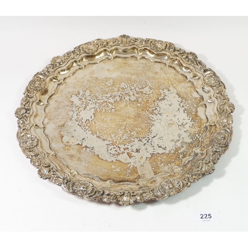 225 - A silver plated tray with applied shell and scrollwork border, 35.5cm diameter