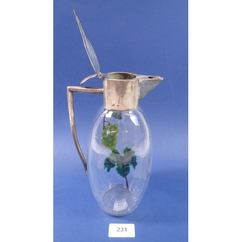 231 - An Austrian cameo cut glass claret jug with vine decoration and silver collar, lid and handle