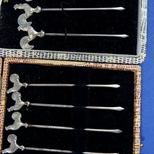 294 - Two cased sets of sterling silver cocktail sticks with cockerel finials