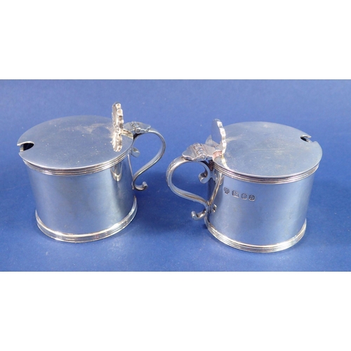 338 - A pair of silver drum mustard pots, London 1978 by C J Vander, 197gm