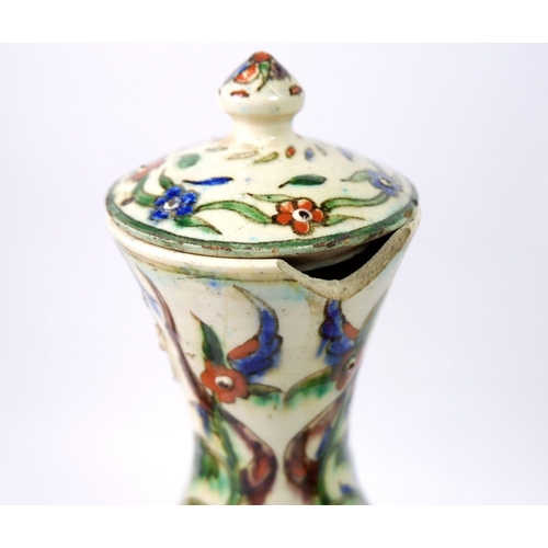 40 - An Isnik pottery vase and cover, a/f 32cm, a frog tobacco jar a/f and a faience flask