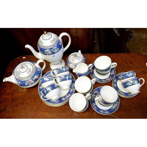 60 - A Wedgwood Blue Siam tea set comprising: teapot, fourteen tea cups, four saucers, five tea plates, m... 