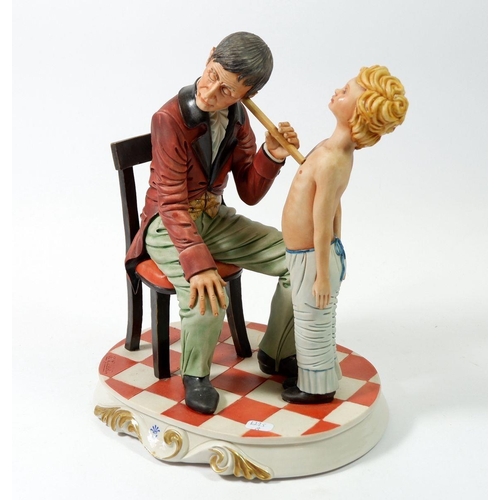 65 - A Capodimonte group 'The Physician' 25cm tall