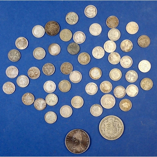 674 - A quantity of silver content coinage including: Victoria 1889 halfcrown and silver threepences, Vict... 