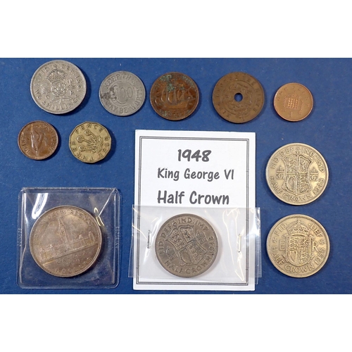 689 - A quantity of British coinage: farthing through halfcrowns plus Rhodesia penny 1952, token: weekly T... 