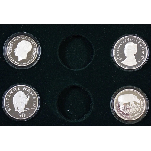 708 - Ten 1974 silver proof (925) coins from the Wildlife Conservation series in 2 wooden display cases - ... 