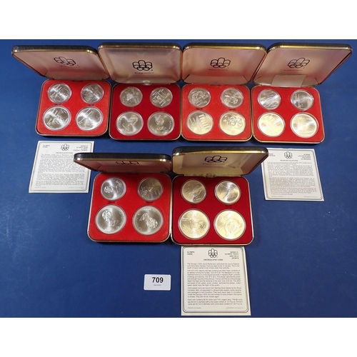 709 - Six Canadian Olympics silver proof coins sets of four, series I to VI (24) over 800g silver weight, ... 