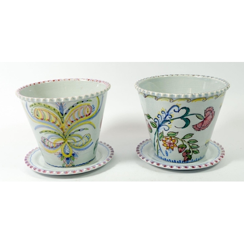 73 - A pair of Portuguese pottery flower pots and stands