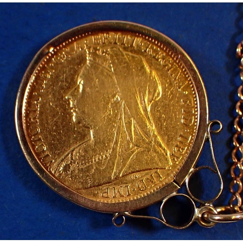 737 - A gold sovereign Victorian 1899 Veiled bust London mint with 9 carat gold chain and surround, approx... 