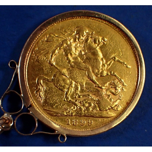 737 - A gold sovereign Victorian 1899 Veiled bust London mint with 9 carat gold chain and surround, approx... 