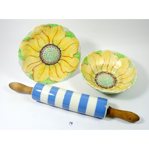 78 - A Hillwood 1930's sunflower strainer dish and a Cornishware rolling pin