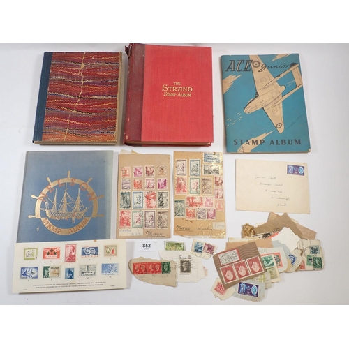 852 - GB & All World: Old notebook and 3 albums with QEII cover, loose used stamps in envelope & 2 Morocco... 