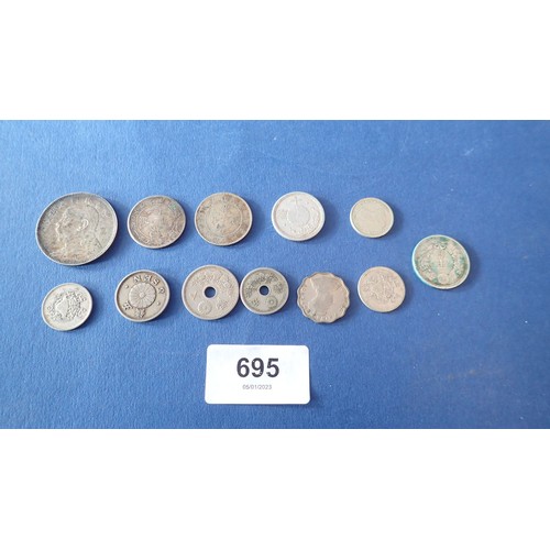 695 - A selection of Chinese coinage