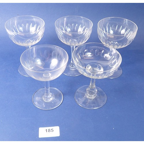 185 - A set of six cut glass champagne glasses and nine others