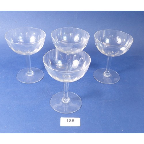 185 - A set of six cut glass champagne glasses and nine others