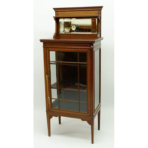 1019 - An Edwardian mahogany single door display cabinet with mirror back and ebony and satinwood banded in... 