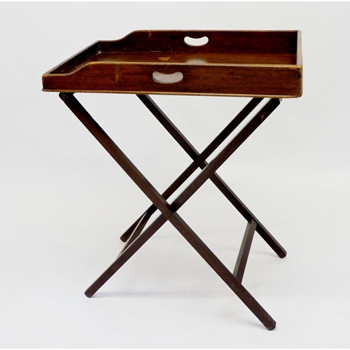 1038 - A butlers tray on folding stand