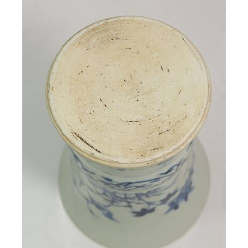 105 - A Ming style blue and white flared vase, 20cm