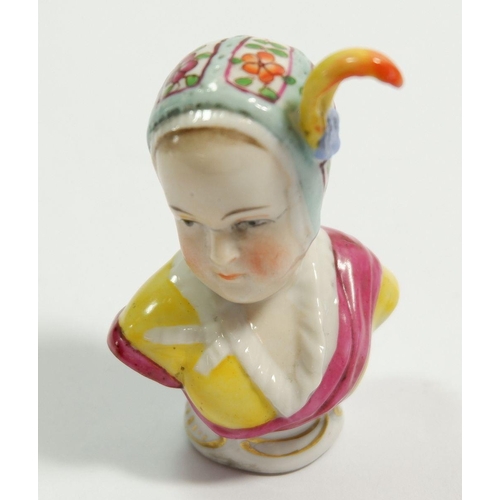 110 - A Höchst porcelain bust of a girl with feather in her cap, 6.5cm