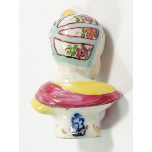 110 - A Höchst porcelain bust of a girl with feather in her cap, 6.5cm