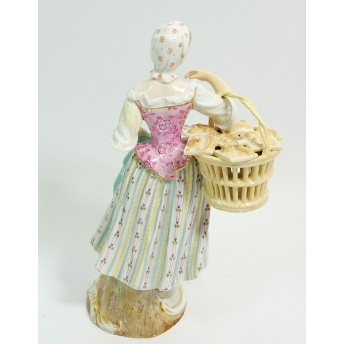 114 - A 19th century Meissen porcelain Cris de Paris figure of a pastry seller, 19cm tall, blue crossed sw... 