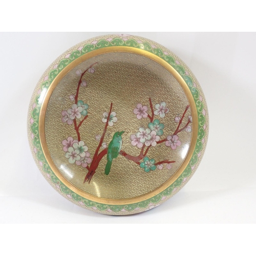 640 - A small oriental cloisonne enamel bowl in pink and green, 21cm diameter