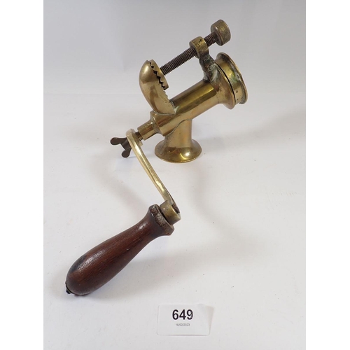 649 - A Victorian brass mincer and an extending toasting fork