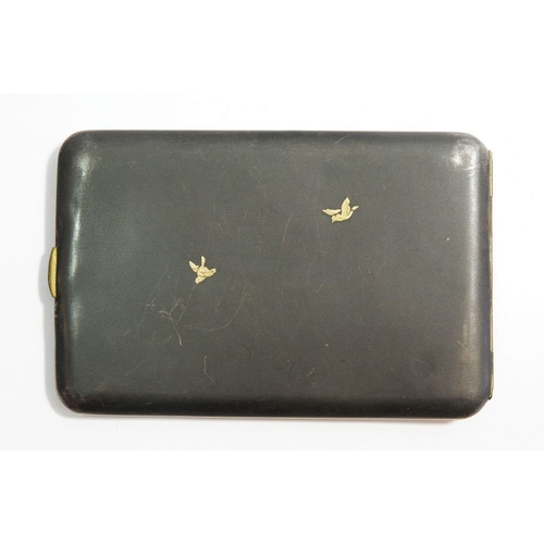 668 - A Japanese Shakundu style cigarette case decorated dragon, signed