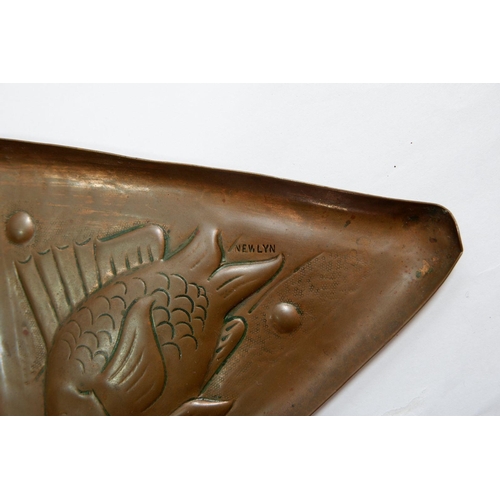 669 - A Newlyn Arts & Crafts copper triangular pin tray embossed fish, stamped mark, 11.5cm