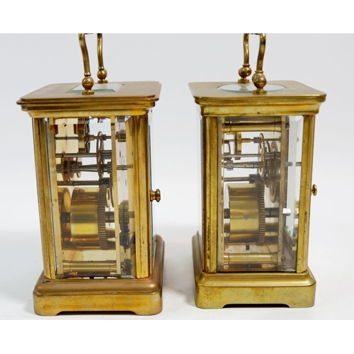 673 - Two brass carriage clocks, one by Matthew Norman, 11cm tall