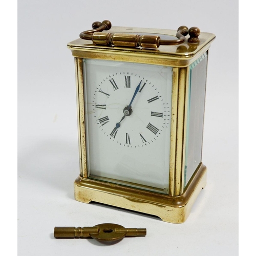 675 - A French brass carriage clock with key, 10.5cm