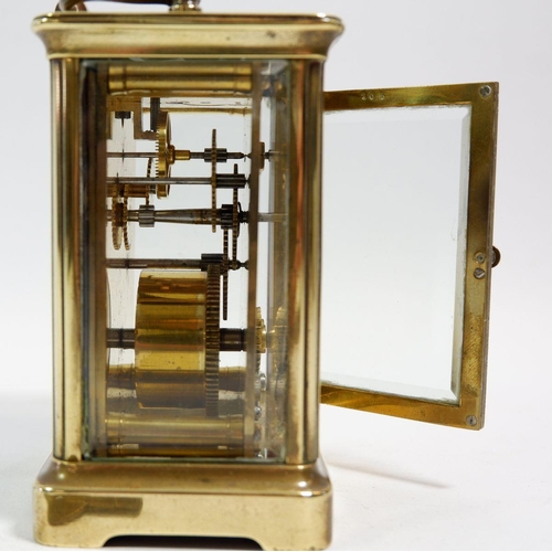 675 - A French brass carriage clock with key, 10.5cm