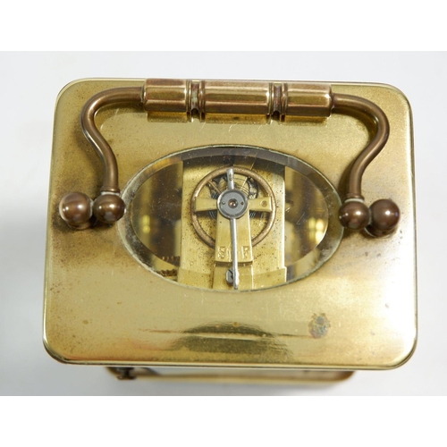 675 - A French brass carriage clock with key, 10.5cm