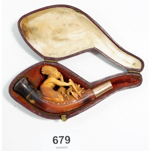 679 - A meerschaum pipe carved Native American figure seated with axe, mounted in gold, mouthpiece missing... 