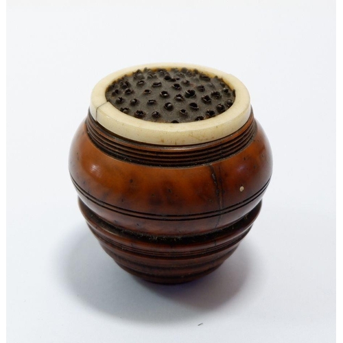 682 - An antique treen nutmeg grater (top missing), 4cm high