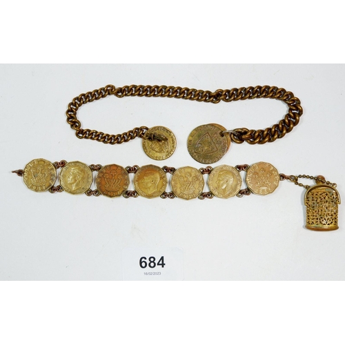 684 - A bracelet of sixpences with miniature antique gilt brass coin or chatelaine purse and a brass fob c... 