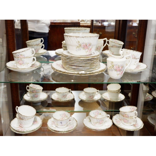 9 - A Victorian floral printed tea service circa 1880 comprising: ten cups, twelve saucers, sugar, milk,... 