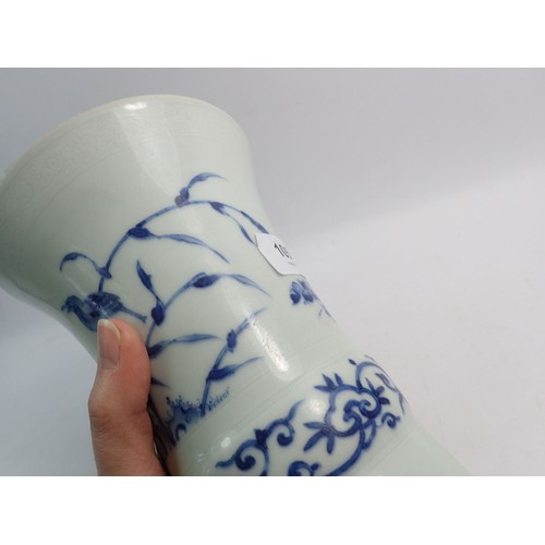 105 - A Ming style blue and white flared vase, 20cm