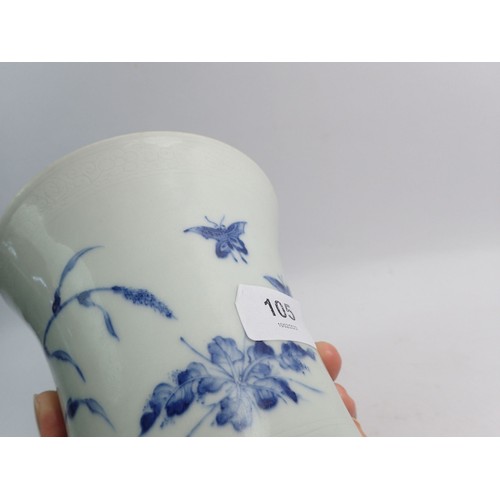 105 - A Ming style blue and white flared vase, 20cm