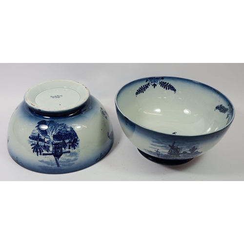 100 - A pair of Royal Bonn blue and white fruit bowls decorated windmills, 24cm diameter