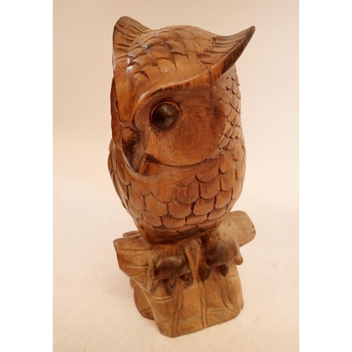 1008 - A large carved wooden owl, 47cm