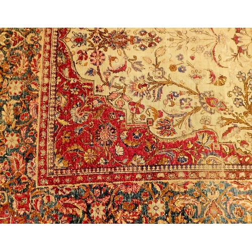 1015 - A Persian antique silk rug with all over floral arch decoration, very worn, 132 x 204cm