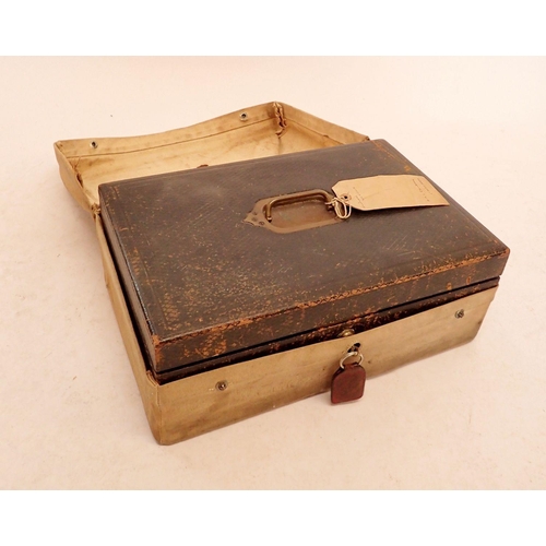 1041 - A Victorian leather document case with canvas case and key