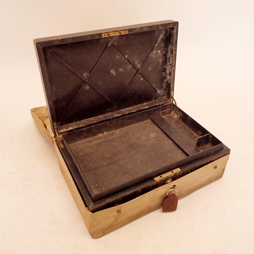 1041 - A Victorian leather document case with canvas case and key